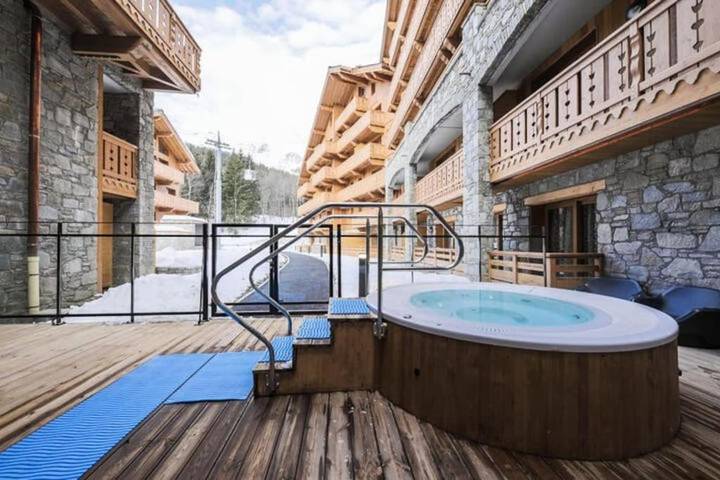 Appart’hôtel pour 4 personnes, avec sauna et piscine ainsi que terrasse et jacuzzi
