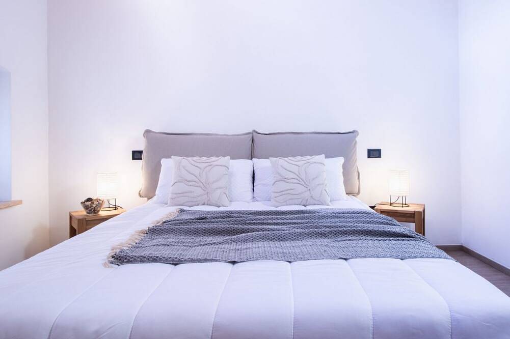 Ganze Wohnung, Guesthost - A splendid 65 sq m apartment, perfect for 4 guests, located on the first floor of a completely renovated period building.The accommodation is located in Valeggio sul Mincio, just an 8-minute walk from the Scaligero Castle, a 15-minute walk fr in Valeggio sul Mincio, Verona Provinz