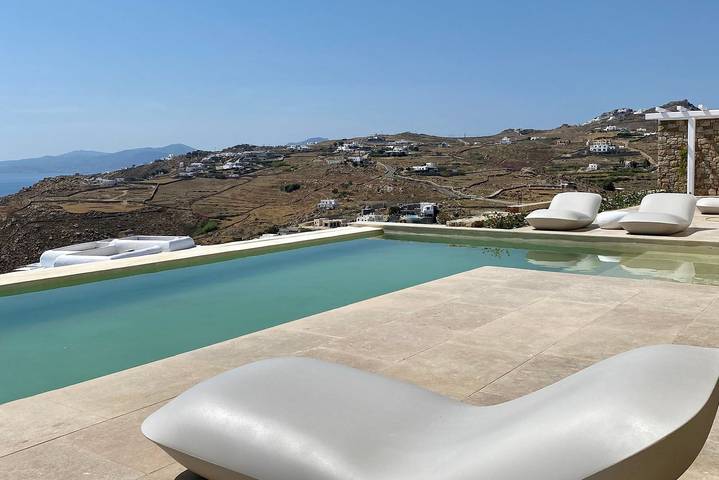Villa per 16 persone, con vista oceano e balcone nonché giardino e piscina a Agios Stefanos