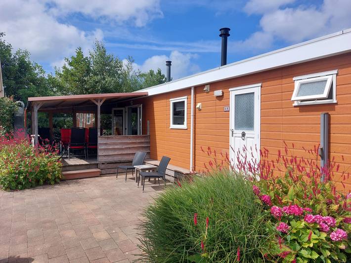 Vakantiepark voor 4 personen, with zwembad and terras as well as tuin in Callantsoog