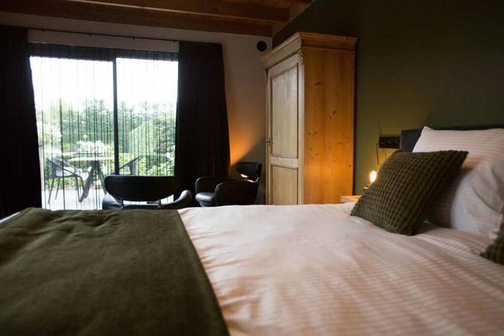 Cottage pour 2 personnes, avec vue ainsi que piscine et jardin à Buggenhout