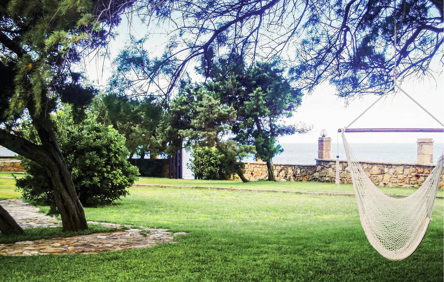 Ganze Ferienwohnung, Apartment mit Meerblick, Terrasse und Parkplatz, 100 m vom Strand entfernt in Ileia