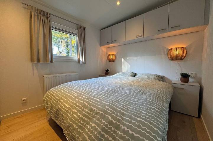 Ferienhaus mit Waldblick und privatem Jacuzzi in Veluwe