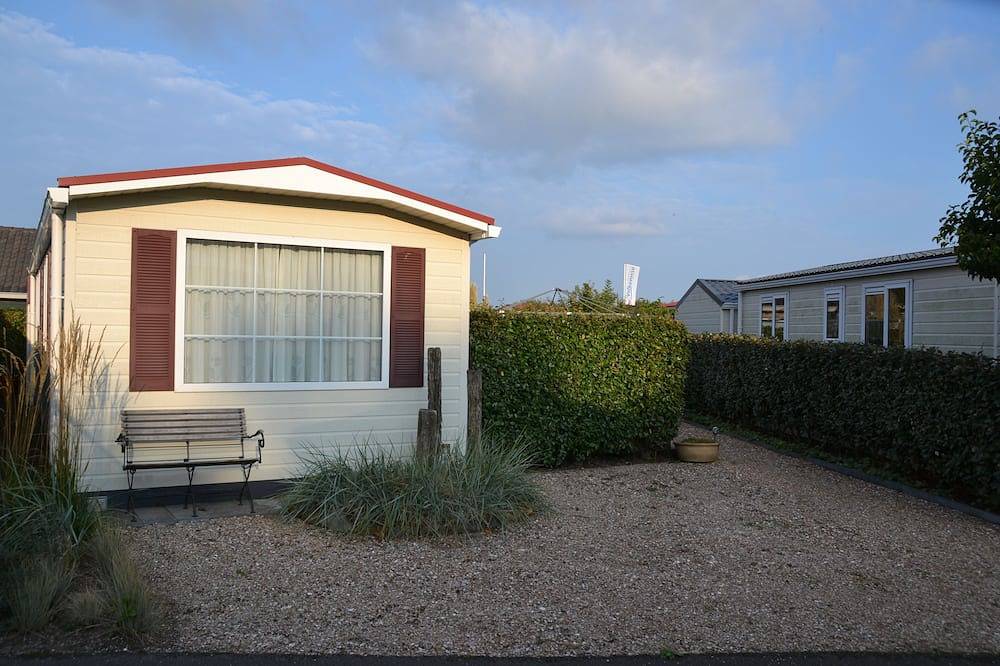 Comfort chalet direct aan het strand in het zonnige Zeeland in Groot Valkenisse, Biggekerke