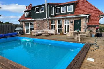 Ferienhaus für 4 Personen, mit Pool und Garten in Ostermarsch