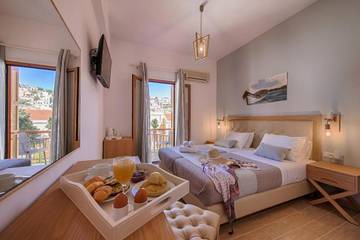 Maison d’hôte pour 2 personnes, avec terrasse et jardin dans Symi