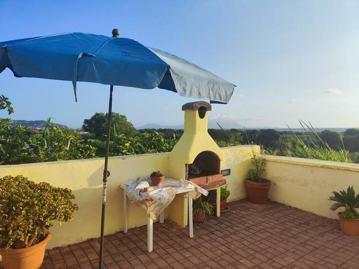 Casa vacanza per 5 persone, con panorama e giardino, adatto a famiglie con bambini a Bacoli