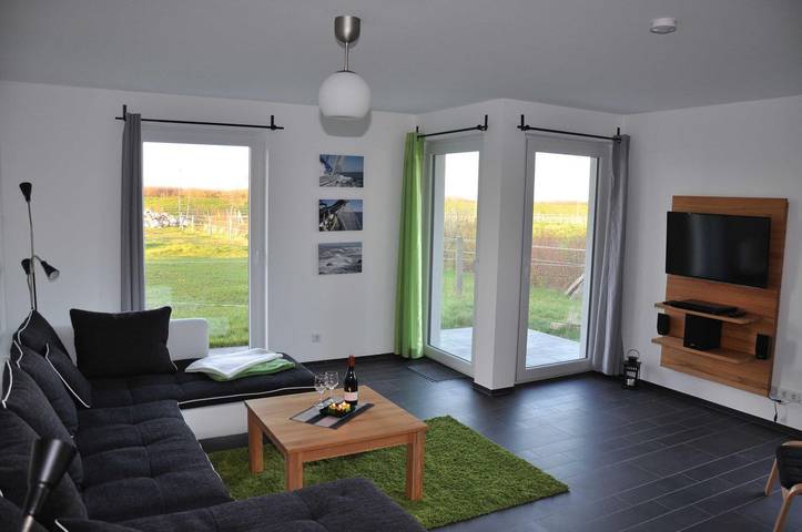 Ferienwohnung für 4 Personen, mit Terrasse und Garten sowie Sauna in Börgerende-Rethwisch