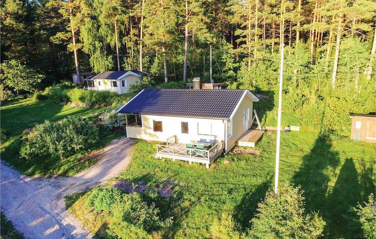 Ferienhaus für 6 Personen, mit Terrasse und Garten sowie Seeblick