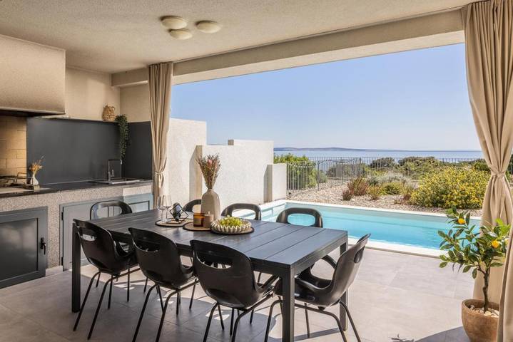 Villa pour 10 personnes, avec vue et jardin ainsi que piscine et terrasse à Punat - 4