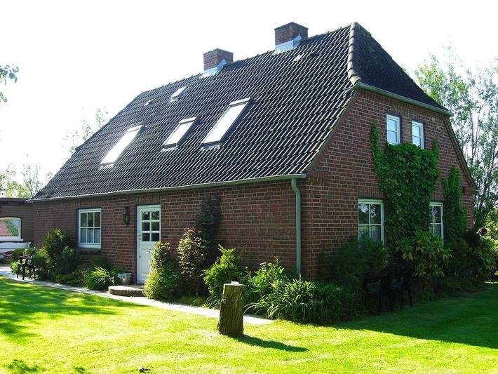 Ferienwohnung für 4 Personen, mit Terrasse und Garten sowie Ausblick in Tümlauer Koog