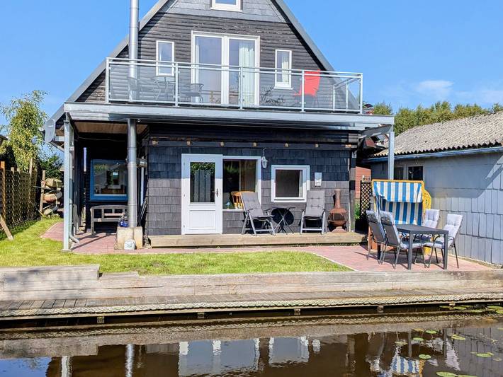 Ferienhaus für 6 Personen, mit Balkon und Terrasse sowie Garten und Sauna in Südbrookmerland