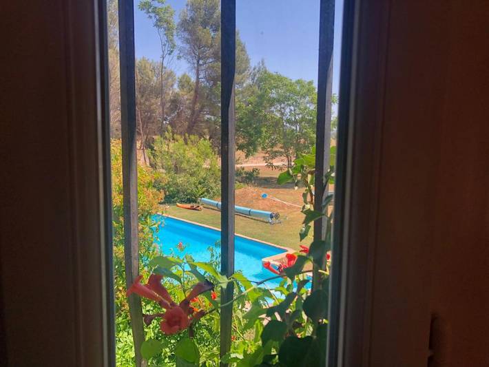 Ferienhaus für 3 Personen, mit Terrasse und Garten sowie Pool und Ausblick