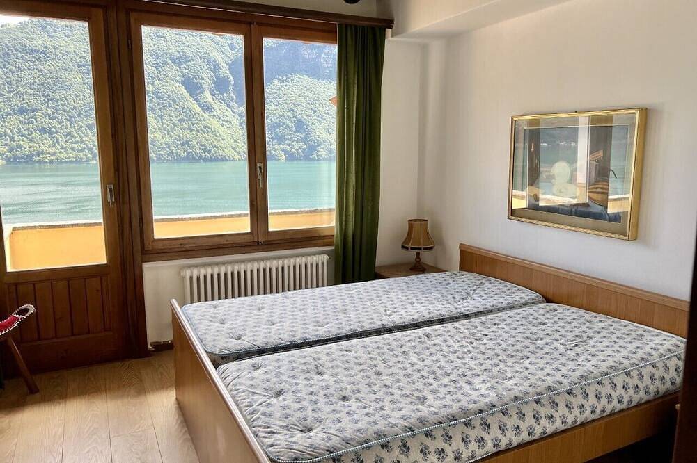 Ganze Wohnung, Exklusives Penthouse mit herrlichem Seeblick, großer Terrasse, Garten & Pool in Cressogno, Valsolda