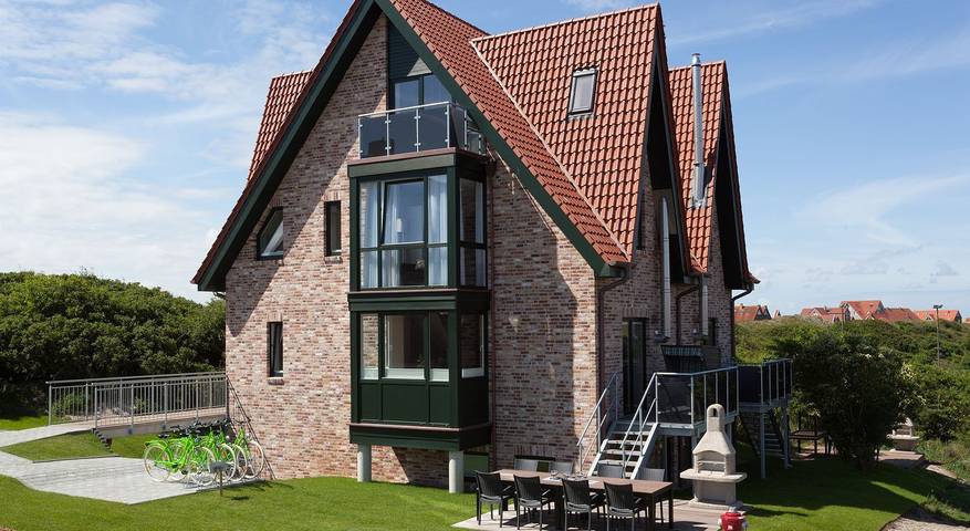 Ferienhaus für 9 Personen, mit Balkon und Balkon/Terrasse sowie Terrasse und Garten auf den Ostfriesische Inseln