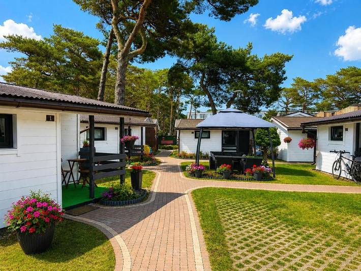 Ferienhaus für 3 Personen, mit Terrasse und Whirlpool sowie Garten und Sauna