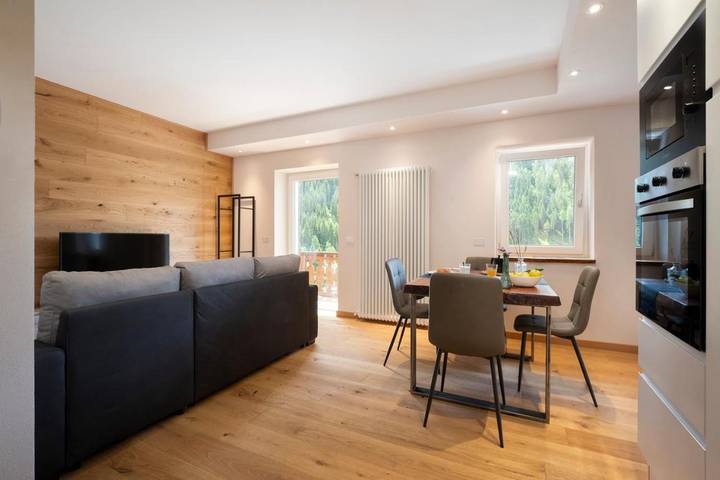 Appartamento per 4 persone, con panorama e vista lago nonché terrazza, con animali domestici in Alleghe