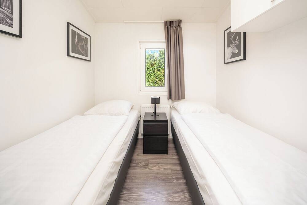 Genießen Sie eine wundervolle Übernachtung in unserer gemütlichen Waldlodge inmitten der Natur. in IJssel