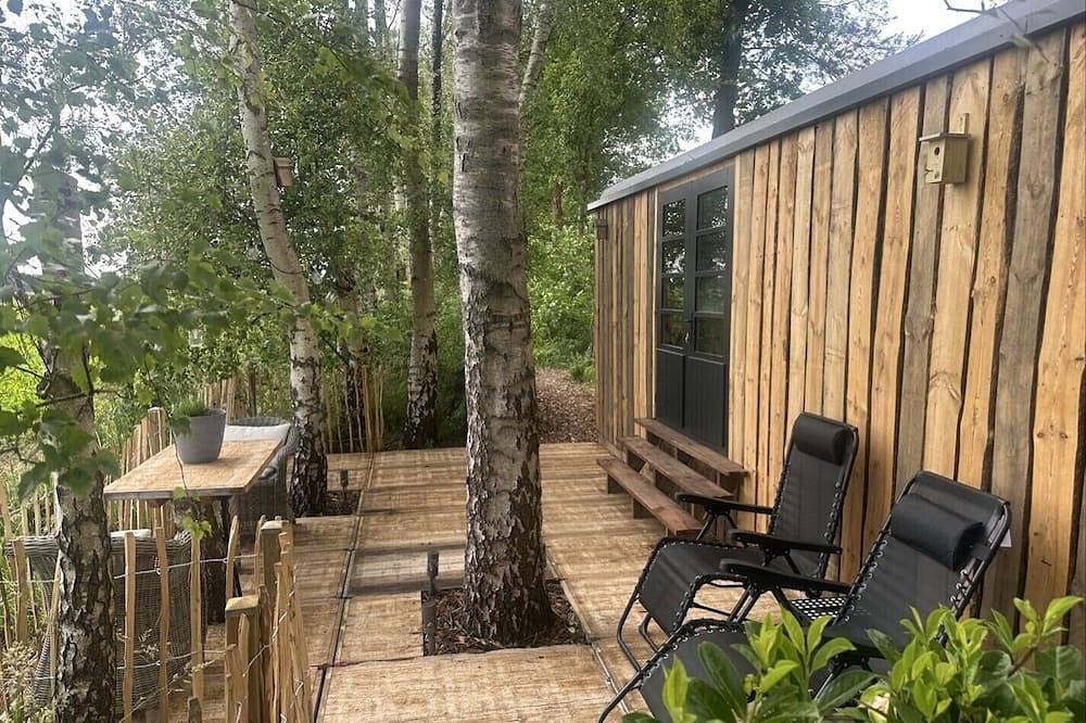 Luxury Pipowagen, cottage in a private forest in Poppel, Ravels