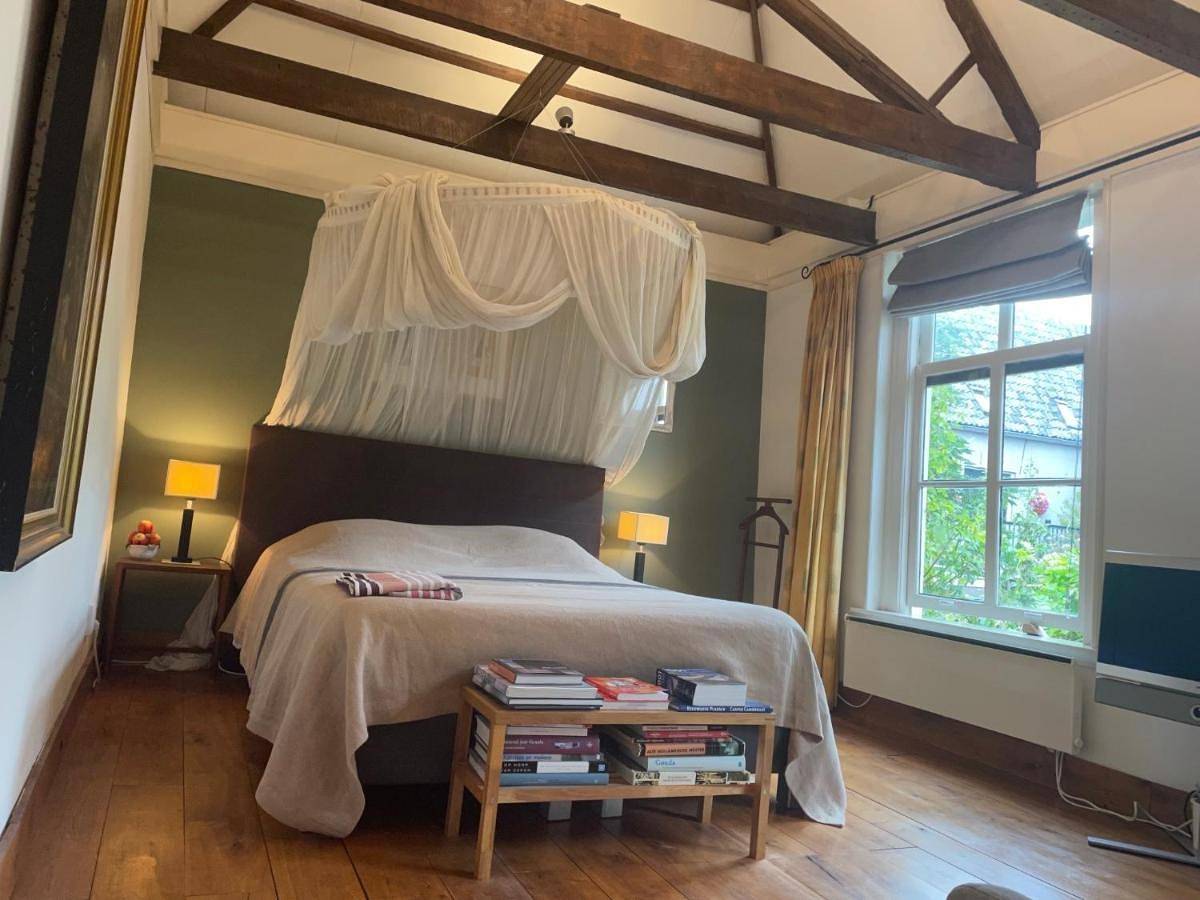 Apple Tree Cottage - charming canal home in our idyllic garden in Gouda, Groene Hart
