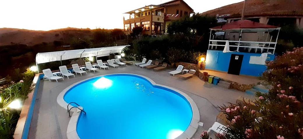 Chambre d’hôte pour 6 personnes, avec Balcon et Terrasse ainsi que Jardin et Piscine dans Santa Elisabetta