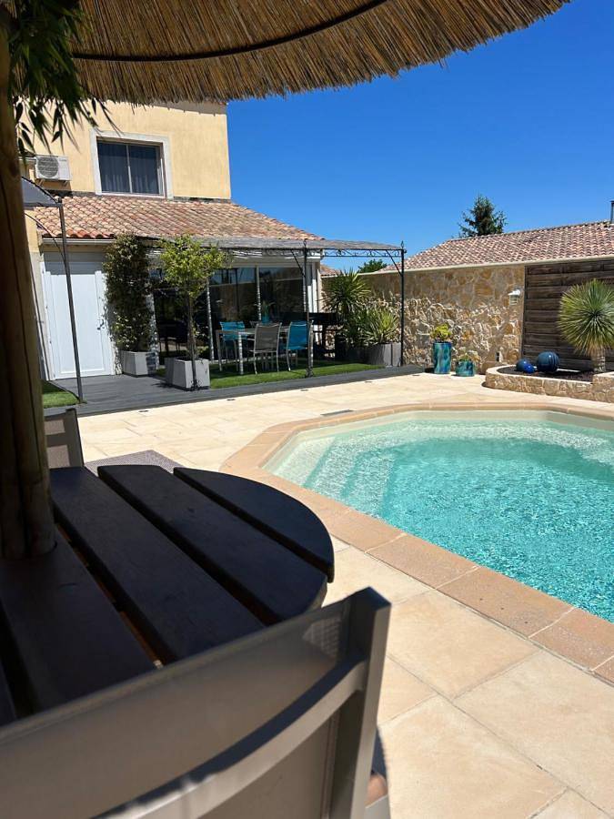 Appartement de vacances pour 4 personnes, avec Terrasse ainsi que Jardin et Piscine