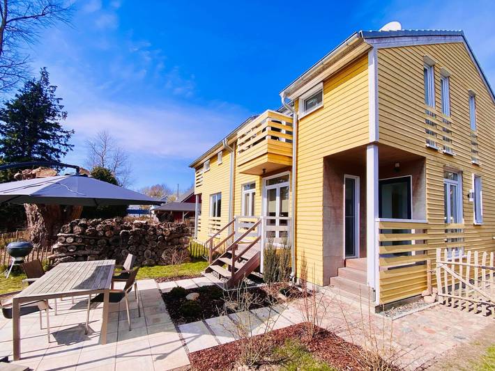 Ferienhaus für 4 Personen, mit Balkon und Terrasse sowie Garten und Sauna in Wiek