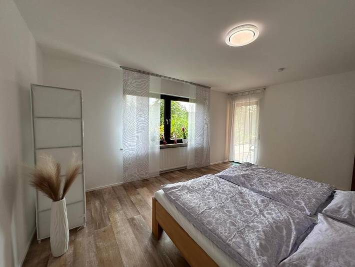 Ferienwohnung für 4 Personen, mit Terrasse und Garten sowie Ausblick