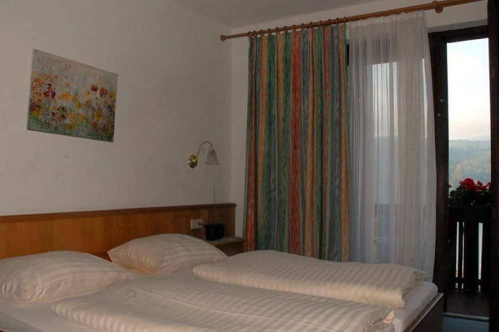 Doppelzimmer superior - Pension Härring direkt am See in Millstatt, Bezirk Spittal an der Drau