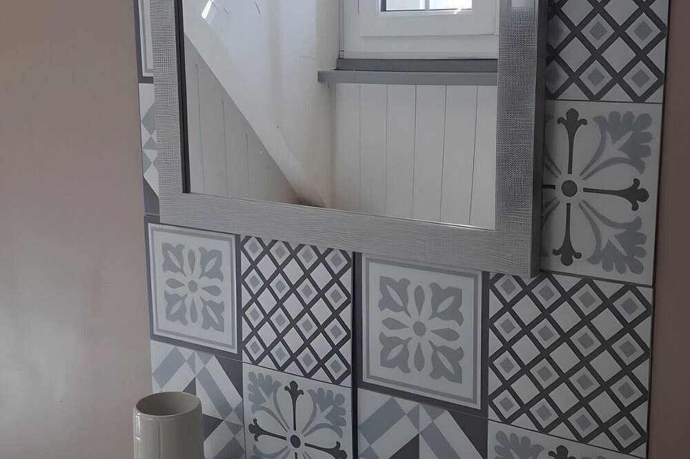 Chambre d'hôtes « Chambre Quadruple » avec piscine partagée, terrasse et Wi-Fi in Chitenay, Sologne