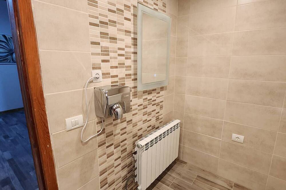 Apartamento entero, This room is a bunk room with two single bunk beds. The bathroom and showers are shared with the two other bunk rooms . The room has a great view of the village square. in Vilaflor de Chasna, Tenerife Sur