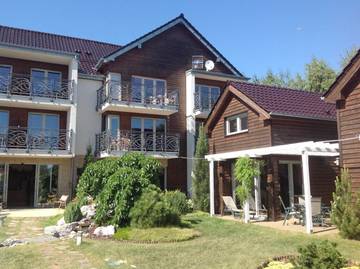 Ferienhaus für 2 Personen, mit Ausblick und Garten in Leba