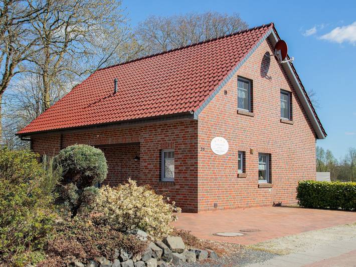 Ferienhaus für 4 Personen, mit Terrasse und Garten sowie Seeblick in Landkreis Aurich
