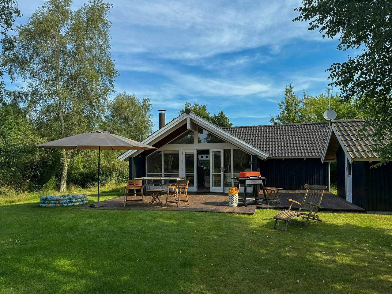 Houten huis met tuin op het zuiden aan het strand van Reersø in Gørlev, Kalundborg en omgeving