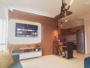 Gîte pour 5 personnes, avec bassin pour enfant et jardin ainsi que vue et piscine dans Asilah