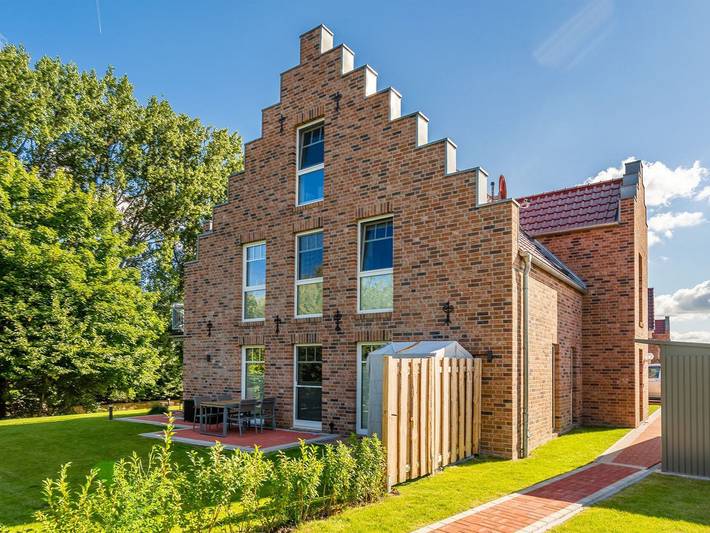 Ferienwohnung für 4 Personen, mit Terrasse und Sauna sowie Garten, kinderfreundlich in Eilsum