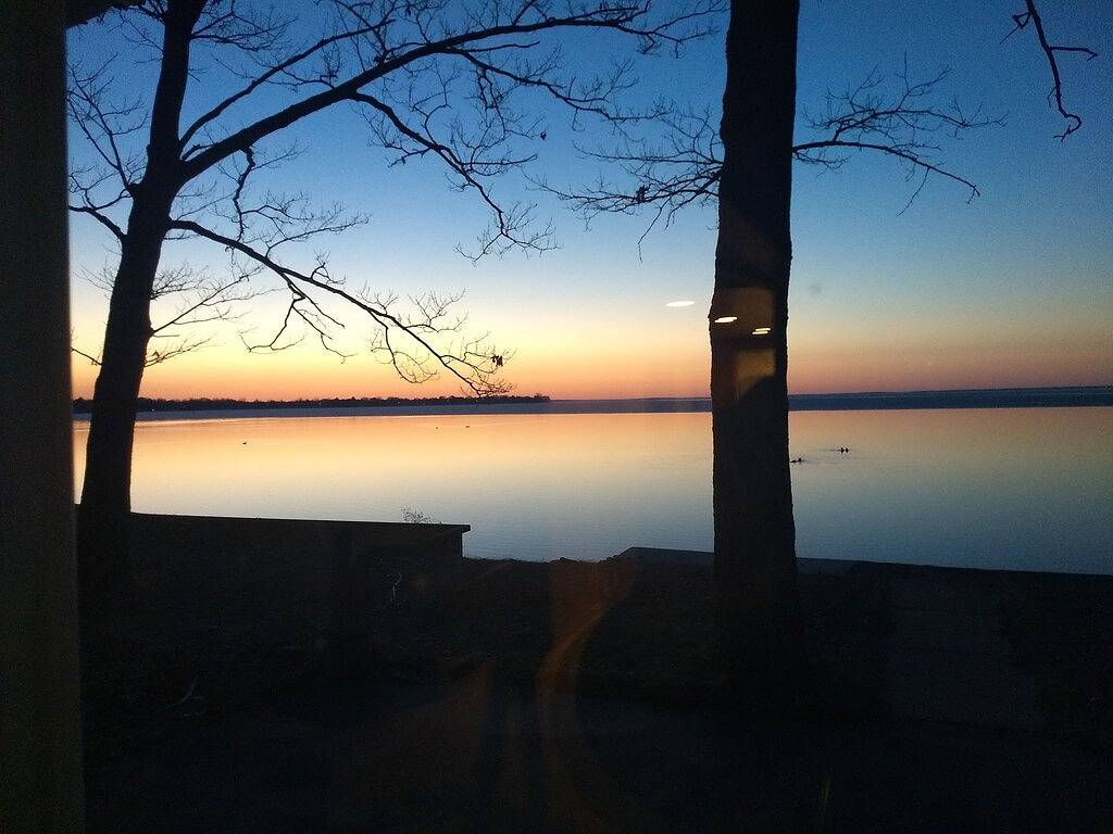 Private Lakefront Cottage with 90' of sandy East Bay frontage on Houghton Lake in Prudenville, Roscommon County