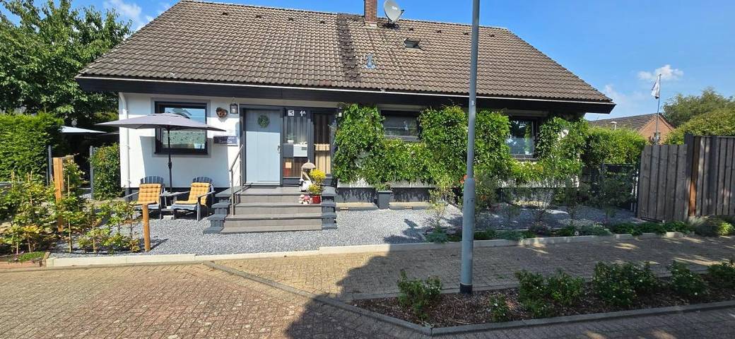 Ferienwohnung für 4 Personen, mit Terrasse und Garten sowie Ausblick in Rees