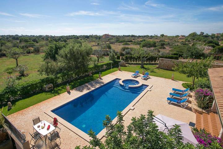Villa pour 12 personnes, avec Jardin ainsi que Bassin pour enfant et Piscine à Cala Ferrera