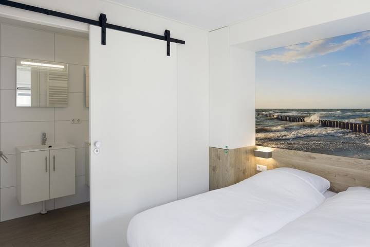 Strandhaus für 4 Personen, mit Terrasse und Sauna sowie Garten und Seeblick in Kamperland - 4