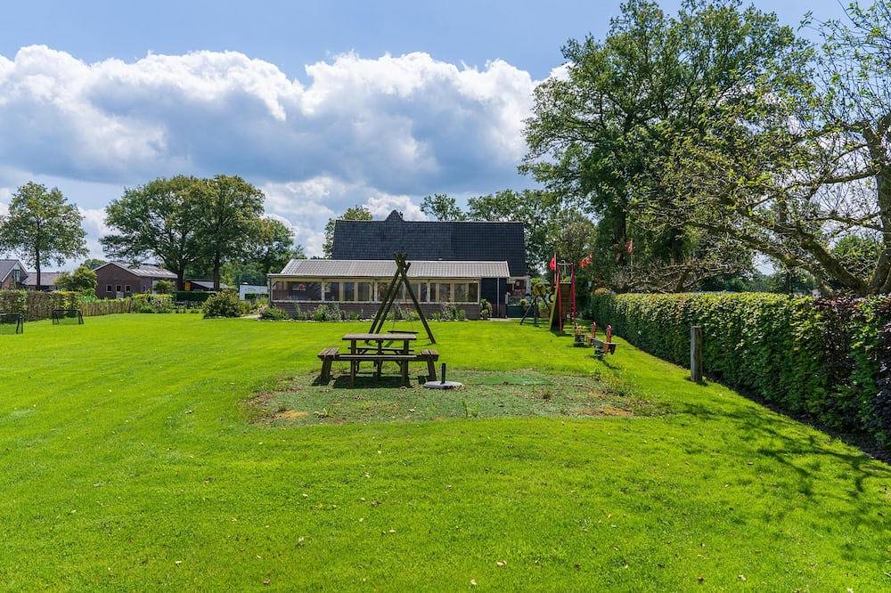 Familie vakantiehuis met grote serre en uitzicht in Hellendoorn, Sallandse Heuvelrug