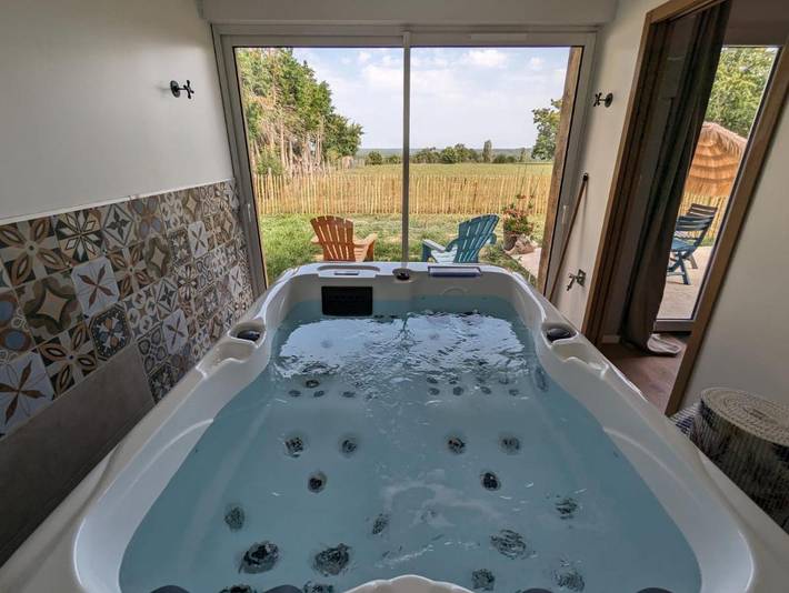 Maison de vacances pour 2 personnes, avec jardin ainsi que piscine et jacuzzi