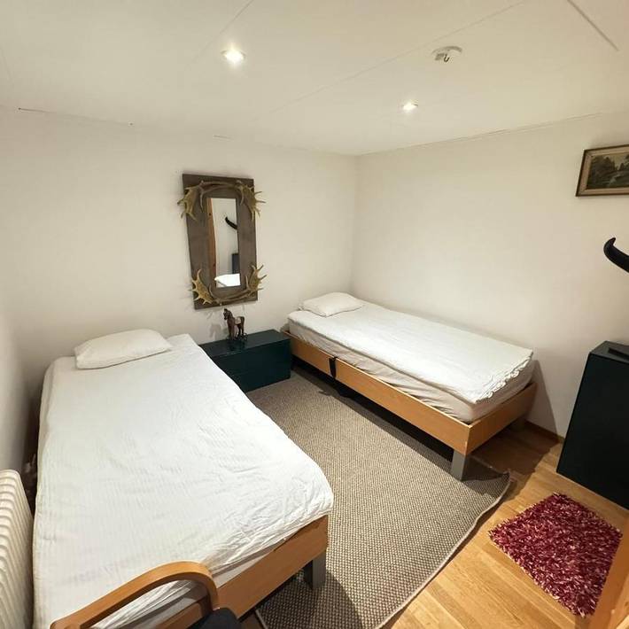 Ferienwohnung für 3 Personen, mit Terrasse und Garten sowie Seeblick