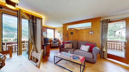 Ferienwohnung für 4 Personen, mit Balkon und Ausblick in La Punt-Chamues-ch