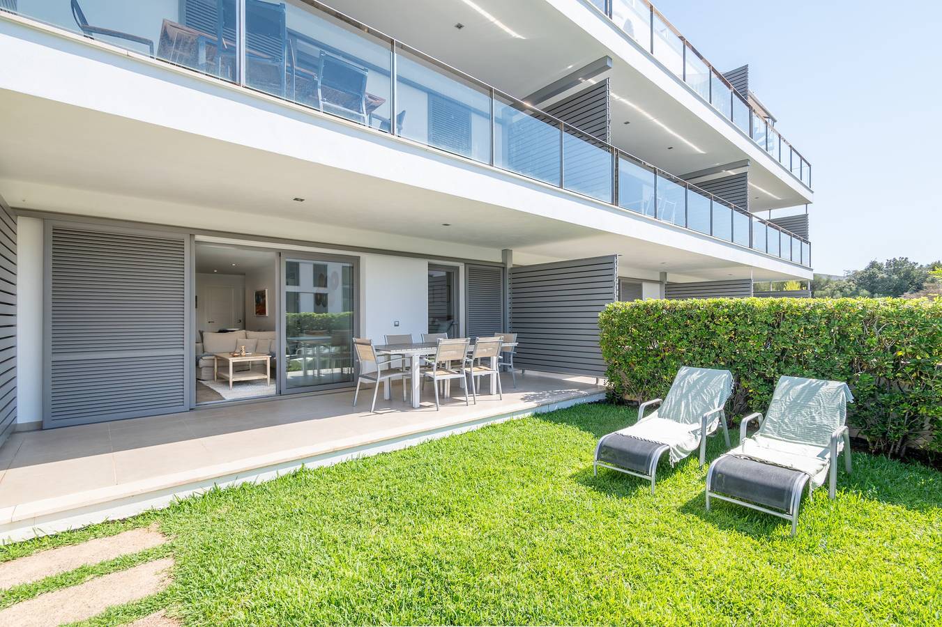 Appartement entier, Appartement 'Boquer' avec piscine partagée, 2 terrasses privées et Wi-Fi in Port de Pollença, Pollença