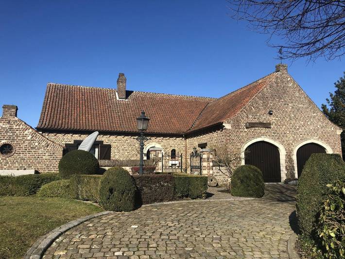 Villa pour 14 personnes, avec Terrasse ainsi que Jardin et Sauna à Bilzen