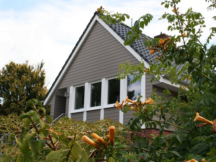 Ferienwohnung für 4 Personen, mit Terrasse und Garten in Jade