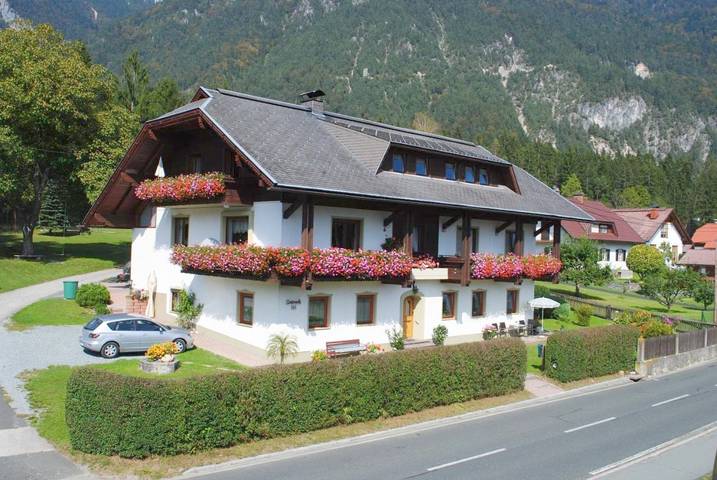 Ferienwohnung für 2 Personen, mit Balkon und Garten sowie Seeblick und Ausblick am Pressegger See