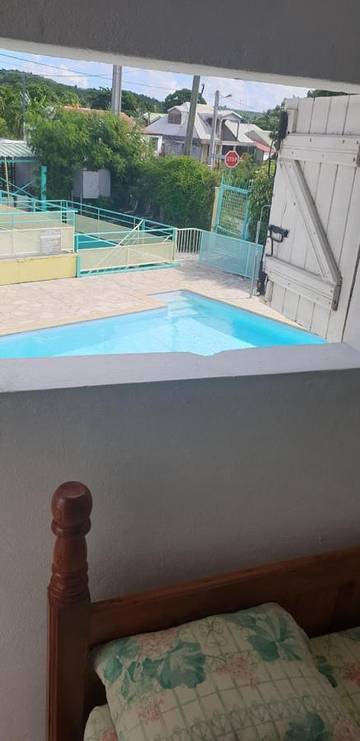 Hôtel pour 2 personnes, avec bassin pour enfant et balcon ainsi que vue et piscine, adapté aux familles à Grand-Bourg