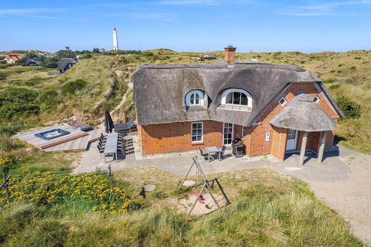 Ferienhaus für 12 Personen, mit Whirlpool und Pool sowie Sauna, mit Haustier in Blavand